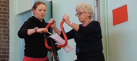Siobhan instructing a woman exercising