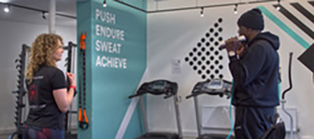 man exercising in gym